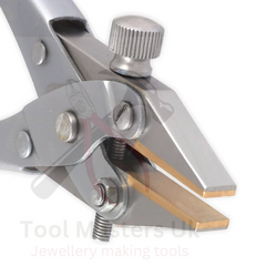Adjustable parallel pliers with flat nose and brass-lined jaws.

